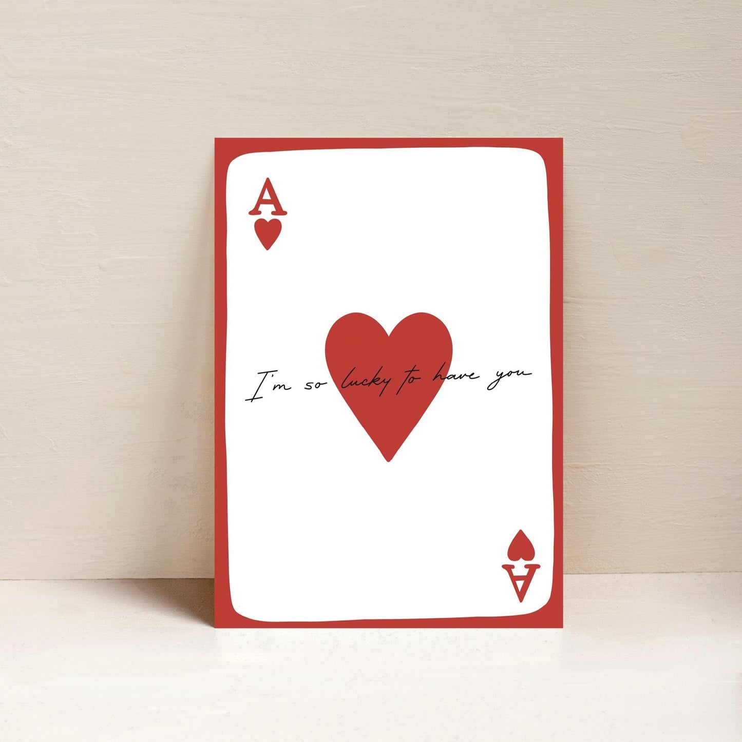 A playing card-themed A4 art print with the text 'I'm So Lucky To Have You' on a white background, featuring a red ace of hearts.